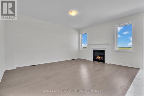85 Brethet Heights, New Tecumseth, ON - Indoor With Fireplace