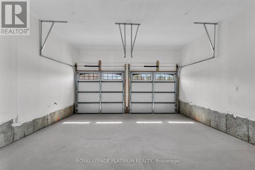 85 Brethet Heights, New Tecumseth, ON - Indoor Photo Showing Garage
