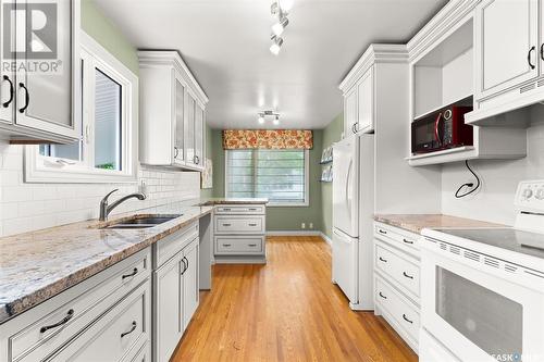 53 Flamingo Crescent, Regina, SK - Indoor Photo Showing Kitchen With Double Sink
