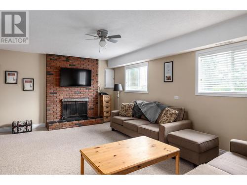 3354 Mcginnis Road, Westbank, BC - Indoor Photo Showing Living Room With Fireplace