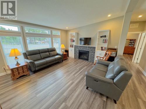 110 China Creek Road W Road, Princeton, BC - Indoor Photo Showing Living Room With Fireplace