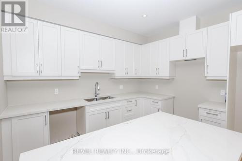 110 Elvira Way, Thorold, ON - Indoor Photo Showing Kitchen With Double Sink