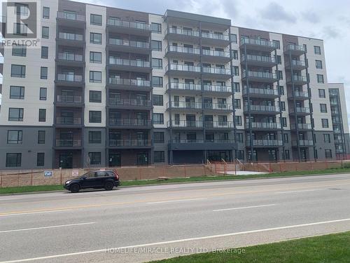 516 - 181 Elmira Road S, Guelph (West Willow Woods), ON - Outdoor With Balcony With Facade