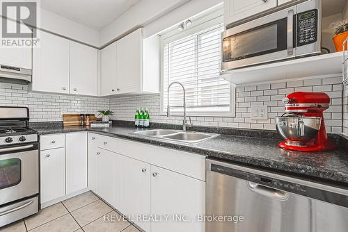 66 Raspberry Lane, Guelph, ON - Indoor Photo Showing Kitchen With Double Sink