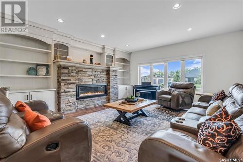 426 Greenbryre Lane, Greenbryre, SK - Indoor Photo Showing Living Room With Fireplace