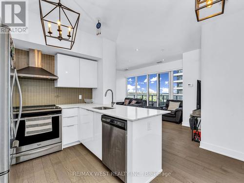 530 - 30 Shore Breeze Drive E, Toronto (Mimico), ON - Indoor Photo Showing Kitchen With Upgraded Kitchen