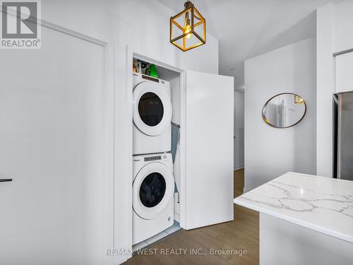 530 - 30 Shore Breeze Drive E, Toronto (Mimico), ON - Indoor Photo Showing Laundry Room