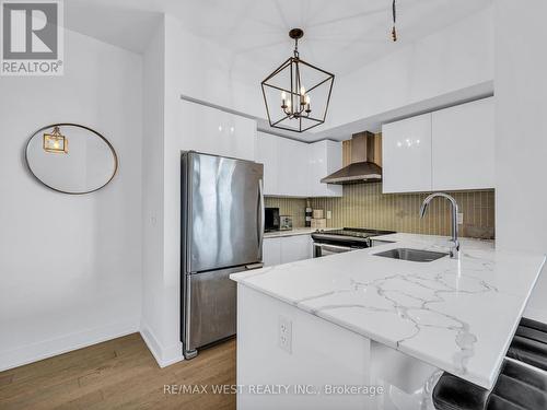 530 - 30 Shore Breeze Drive E, Toronto (Mimico), ON - Indoor Photo Showing Kitchen