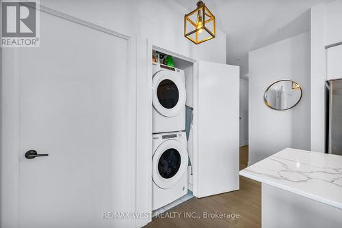 530 - 30 Shore Breeze Drive E, Toronto (Mimico), ON - Indoor Photo Showing Laundry Room