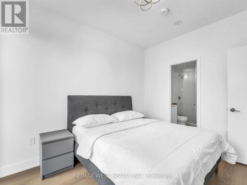 530 - 30 Shore Breeze Drive E, Toronto (Mimico), ON - Indoor Photo Showing Bedroom