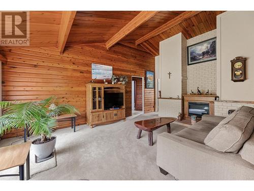 133 Snowsell Street, Kelowna, BC - Indoor Photo Showing Living Room With Fireplace