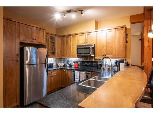 6 - 1595 Whitetooth Trail, Golden, BC - Indoor Photo Showing Kitchen With Double Sink