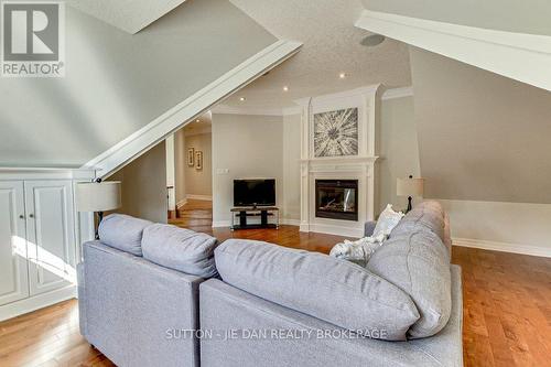 1990 Pelkey Road, London, ON - Indoor Photo Showing Living Room With Fireplace