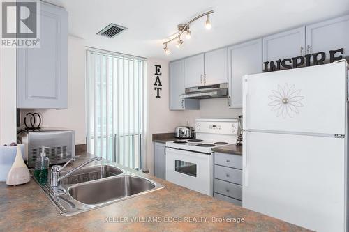 802 - 2585 Erin Centre Boulevard E, Mississauga, ON - Indoor Photo Showing Kitchen With Double Sink