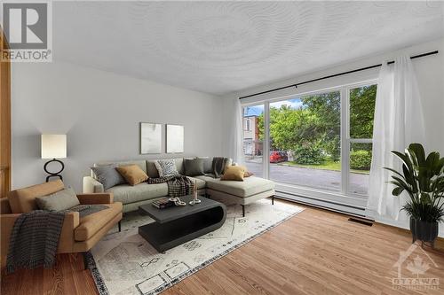 *virtually staged. - 374 Dieppe Street, Ottawa, ON - Indoor Photo Showing Living Room