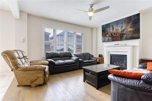 20 Lise Lane, Caledonia, ON - Indoor Photo Showing Living Room With Fireplace