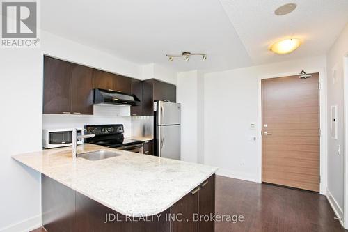 911 - 23 Sheppard Avenue E, Toronto, ON - Indoor Photo Showing Kitchen With Double Sink