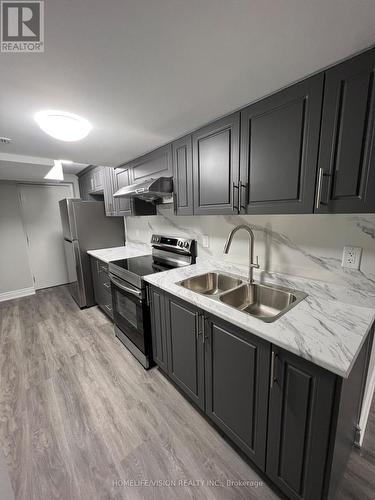 Lower - 3282 Sunlight Street, Mississauga, ON - Indoor Photo Showing Kitchen With Double Sink