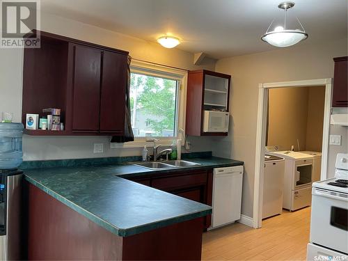 521 Tiverton Avenue, Torquay, SK - Indoor Photo Showing Kitchen With Double Sink