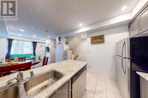 12 - 35 Heron Park Place, Toronto, ON - Indoor Photo Showing Kitchen With Double Sink