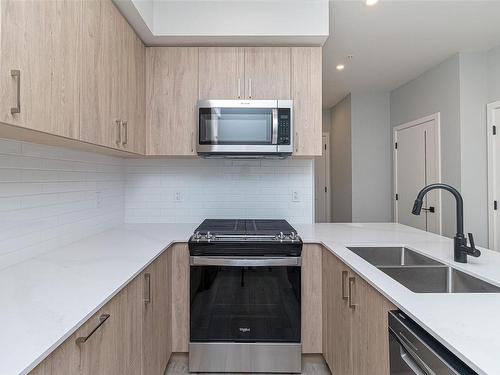 304-654 Granderson Rd, Langford, BC - Indoor Photo Showing Kitchen With Double Sink