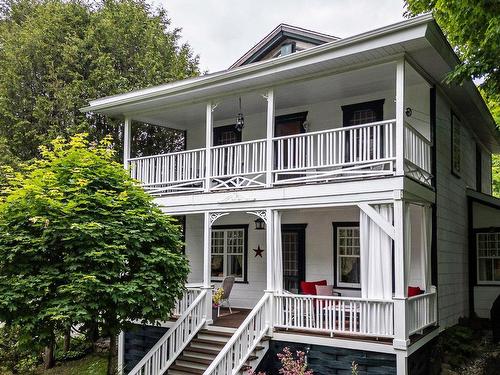 Back facade - 30 Rue Du Sommet, Sainte-Marguerite-Du-Lac-Masson, QC - Outdoor With Deck Patio Veranda