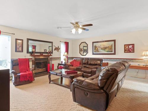 Living room - 149 Rue Wright E., Châteauguay, QC - Indoor Photo Showing Living Room With Fireplace