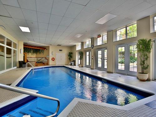 Piscine - 118-1920 Rue Adoncour, Longueuil (Le Vieux-Longueuil), QC - Indoor Photo Showing Other Room With In Ground Pool