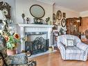 Salon - 118-1920 Rue Adoncour, Longueuil (Le Vieux-Longueuil), QC  - Indoor Photo Showing Living Room With Fireplace 