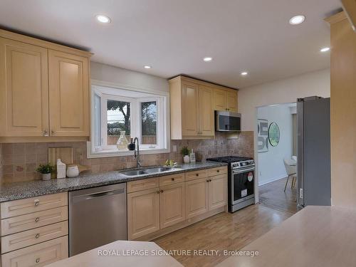 28 Tanjoe Cres, Toronto, ON - Indoor Photo Showing Kitchen With Double Sink