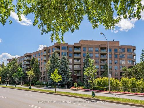 214-1200 Don Mills Rd, Toronto, ON - Outdoor With Balcony With Facade