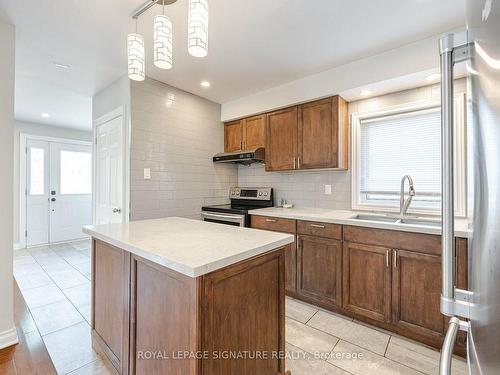 1-71 Redwater Dr, Toronto, ON - Indoor Photo Showing Kitchen With Double Sink