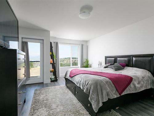 1140 Goldfinch Place, Kelowna, BC - Indoor Photo Showing Bedroom