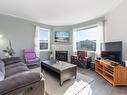 50-6400 Spencer Road, Kelowna, BC  - Indoor Photo Showing Living Room With Fireplace 