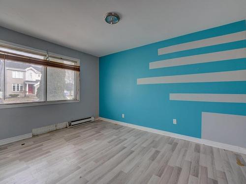 Master bedroom - 12 Rue Gabriel, Châteauguay, QC - Indoor Photo Showing Other Room