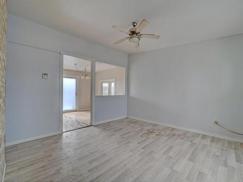 Living room - 12 Rue Gabriel, Châteauguay, QC - Indoor Photo Showing Other Room