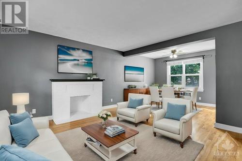 This image is virtually staged. - 1371 Woodward Avenue, Ottawa, ON - Indoor Photo Showing Living Room
