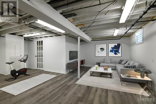 This image is virtually staged. - 1371 Woodward Avenue, Ottawa, ON - Indoor Photo Showing Basement