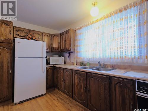 518 1St Street W, Rosetown, SK - Indoor Photo Showing Kitchen With Double Sink