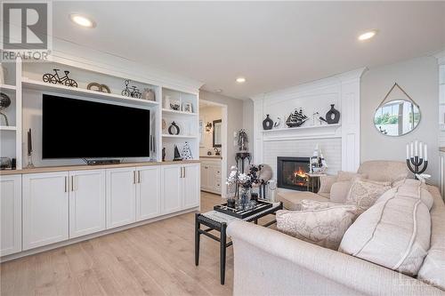 Living room with gas fireplace. - 9 Shoreline Road, Johnstown, ON - Indoor Photo Showing Living Room With Fireplace