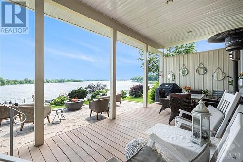 Patio area off main house. Roof is insulated so area could be converted to liveable space. - 9 Shoreline Road, Johnstown, ON - Outdoor With Body Of Water With Deck Patio Veranda With Exterior