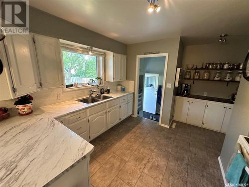 1505 97Th Street, Tisdale, SK - Indoor Photo Showing Kitchen With Double Sink