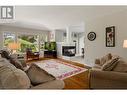 4149 Gallaghers Woodlands Drive, Kelowna, BC  - Indoor Photo Showing Living Room With Fireplace 