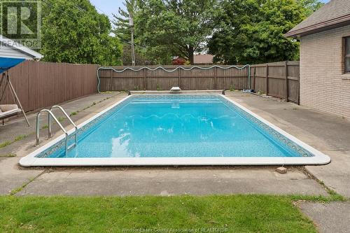 4015 Dougall Avenue, Windsor, ON - Outdoor With In Ground Pool With Backyard