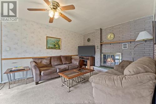 4015 Dougall Avenue, Windsor, ON - Indoor Photo Showing Living Room With Fireplace