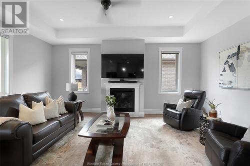 1558 Cypress, Windsor, ON - Indoor Photo Showing Living Room With Fireplace