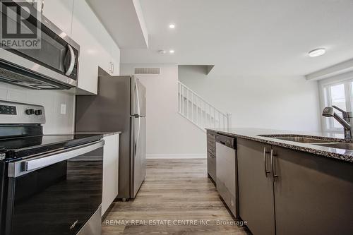 7 - 350 River Road, Cambridge, ON - Indoor Photo Showing Kitchen With Stainless Steel Kitchen With Double Sink