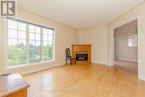 6 Porchlight Road, Brampton, ON - Indoor Photo Showing Living Room With Fireplace