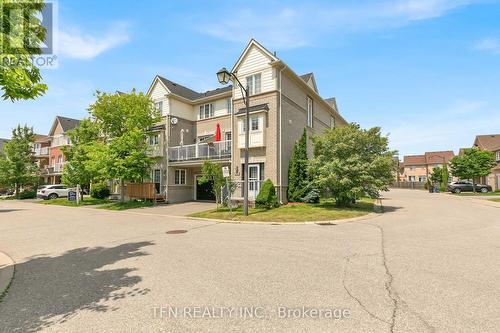 82 - 620 Ferguson Drive, Milton, ON - Outdoor With Balcony With Facade