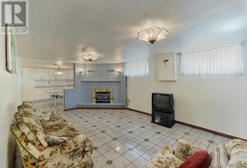 19 Benrubin Drive, Toronto, ON - Indoor Photo Showing Other Room With Fireplace